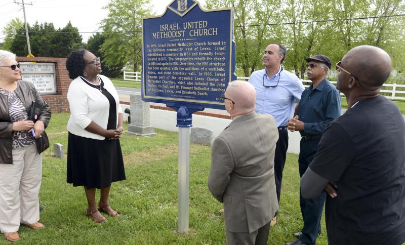 Reading the marker in unison are (l-r) Sandra Neal, the Rev. Marjorie Belmont-Burns, Stephen Marz, Sen. Ernie Lopez, Paul Selby, and Ralph Gooch.